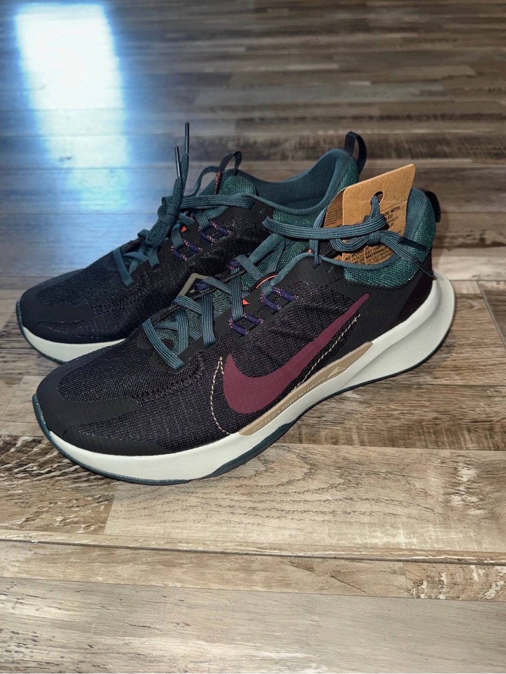 Nike Men's Black Sneakers with Burgundy Swoosh and Teal Accents